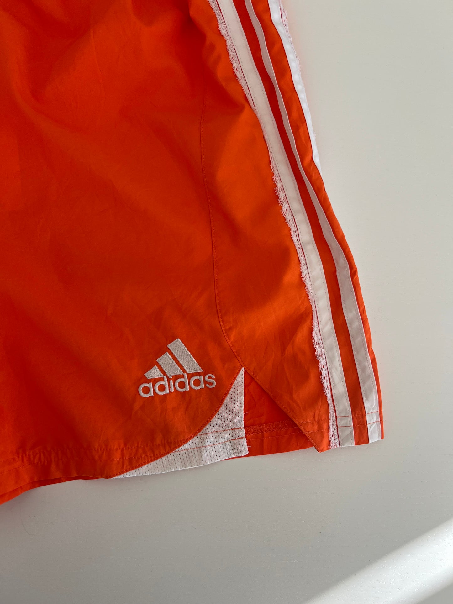 Reworked Lace Orange Vintage Adidas sport shorts.