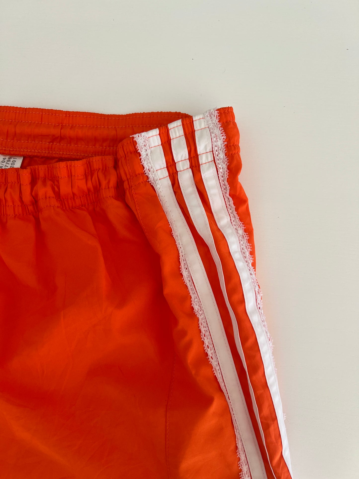 Reworked Lace Orange Vintage Adidas sport shorts.