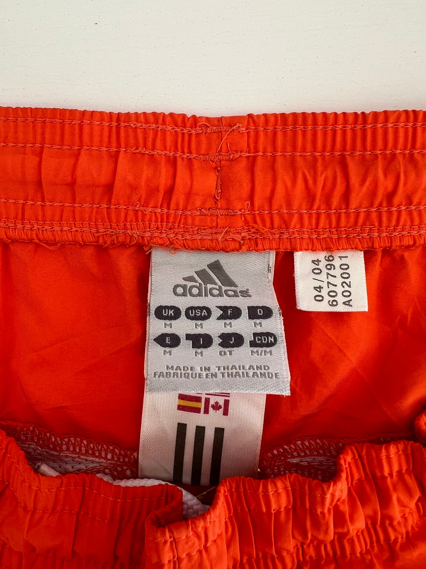 Reworked Lace Orange Vintage Adidas sport shorts.